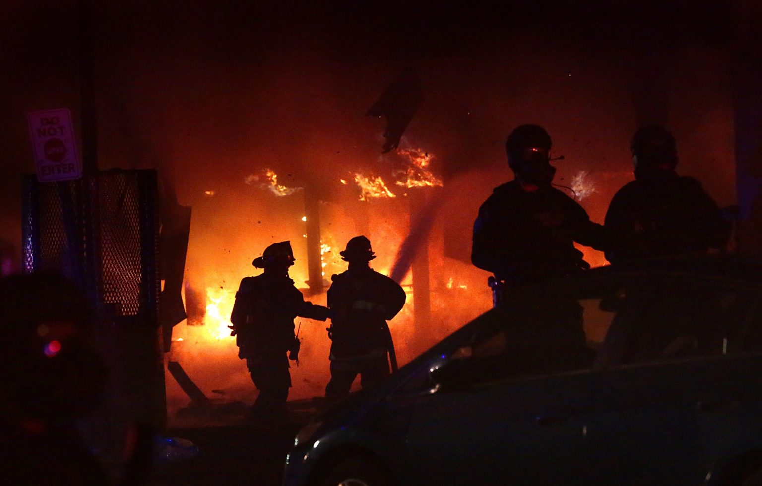 Požiar po proteste BLM v americkom meste St. Louis. Foto: TASR/AP