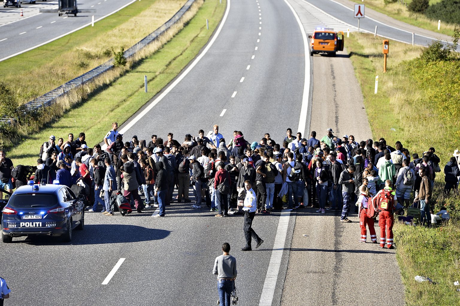 Skupina migrantov v Nemecku. Foto: TASR/AP