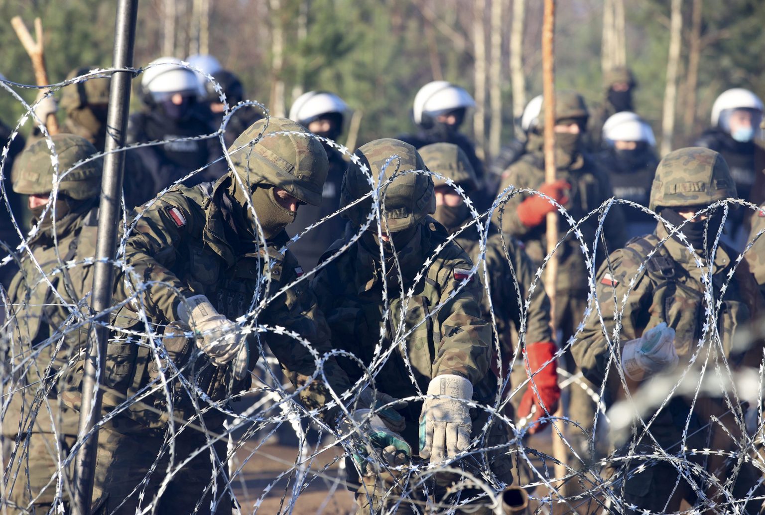 Poľskí vojaci na bielorusko-poľskej hranici. Foto: TASRP/AP
