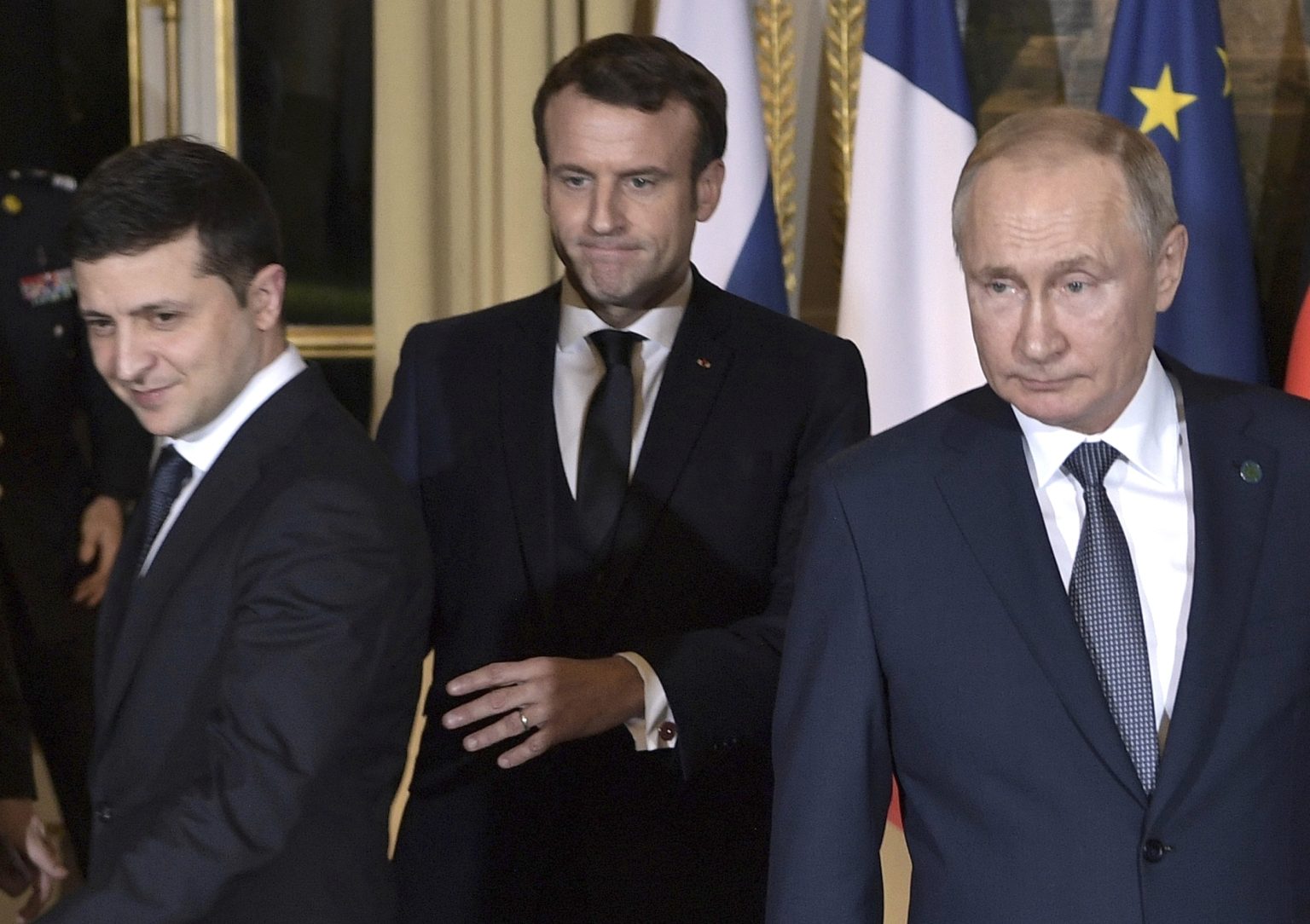 Emmanuel Macron (uprostred), Vladimir Putin (vpravo) a Volodymyr Zelenskyj. Ilustračný záber. Foto: TASR/AP