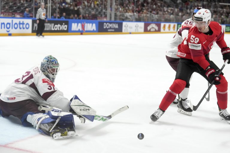 Snímka zo stretnutia Lotyšsko - Švajčiarsko. Foto: TASR/AP