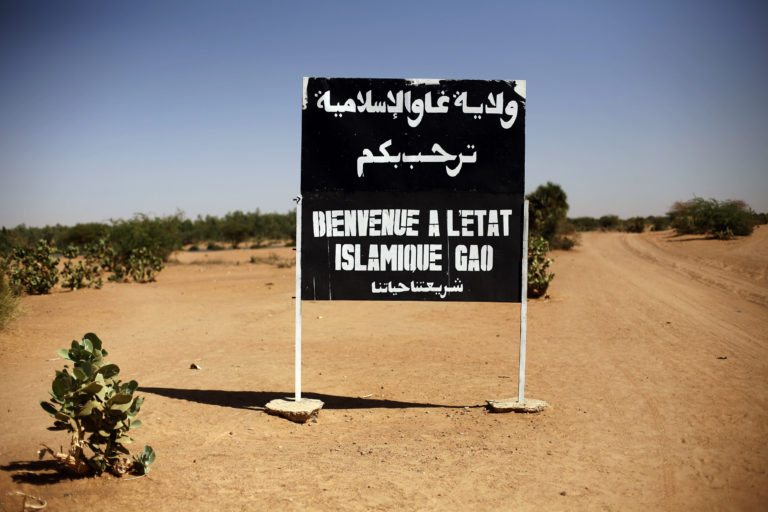 Nápis na severnej ceste z Gao v severnom Mali uvádza: „Vitajte v islamskom štáte Gao 30. januára 2013. Foto: TASR/AP