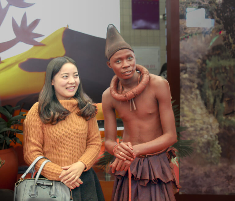Seller waiting buyer at Namibia both during China International Travel Mart. Photo: Yuli Seperi/Getty Images
