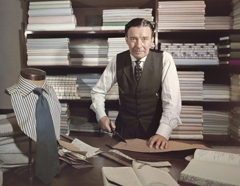 Premium Rates Apply. 1955:  'Mr Clark' head pattern cutter at 'Turnbull and Asser', London tailors. Photo: Slim Aarons/Getty Images