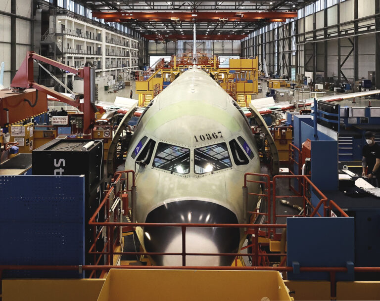 Various new versions of the A320 passenger aircraft family are pictured at the A320 passenger plane assembly line. Photo:  Morris MacMatzen/Getty Images