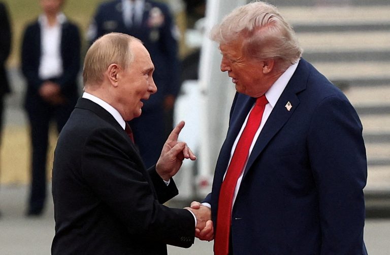 Donald Trump and Vladimir Putin. Photo: Kevin Lamarque/Reuters