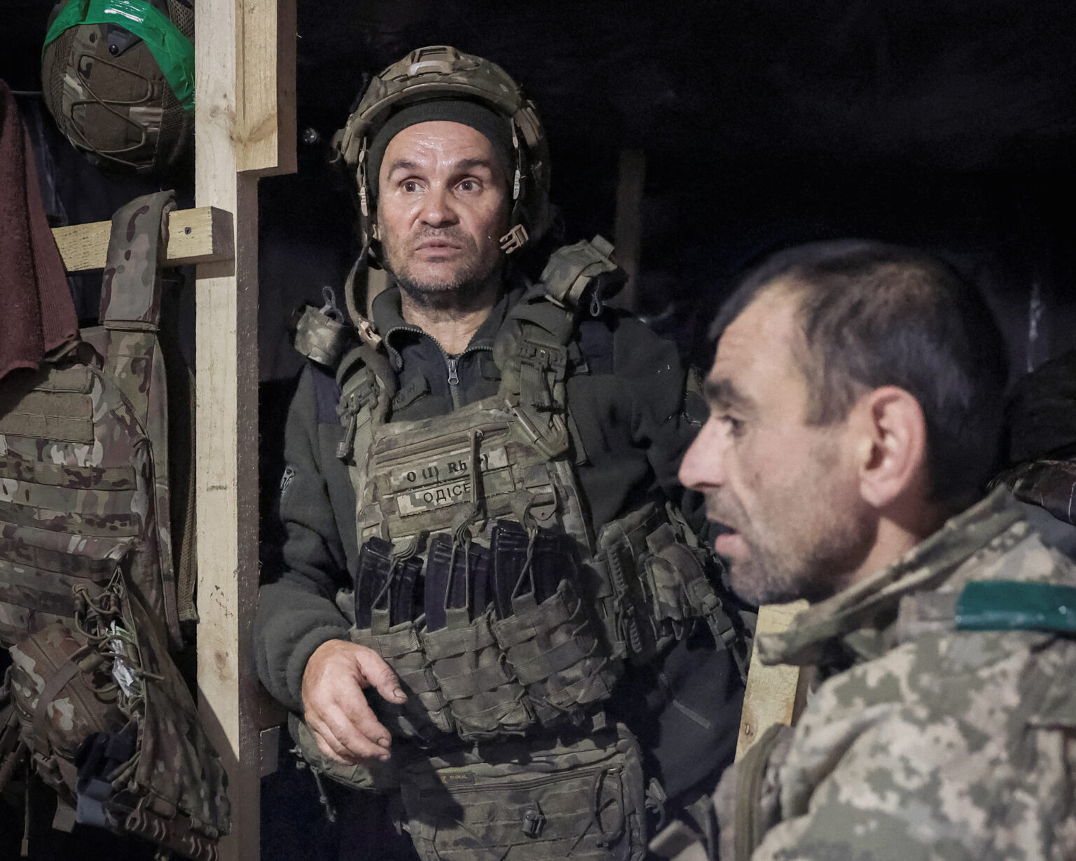 Ukrainian soldiers rest in a trench near the front-line city of Pokrovsk. Photo: Anatolii Stepanov/Reuters