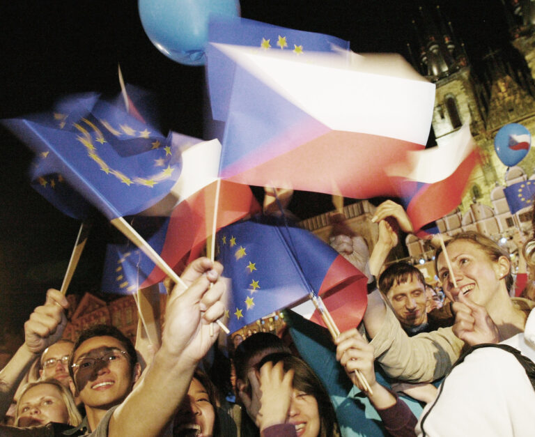People wave flags of the Czech Republic and the European Union. Photo: Sean Gallup/Getty Images