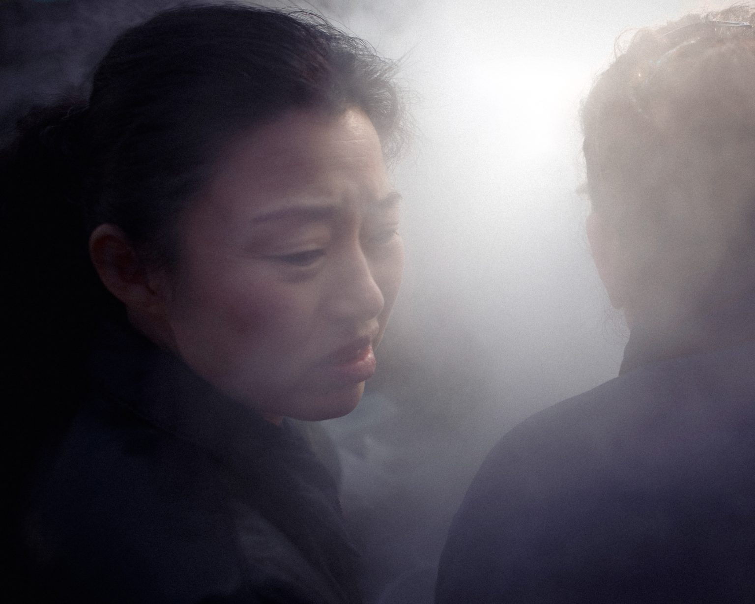 Smoke from heavy industry factories rises into the gray sky. Harbin, China. Photo: Jeff Hutchens/Reportage by Getty Images