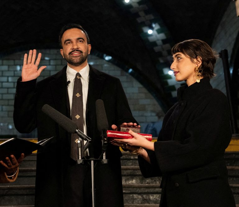 New York's first Muslim mayor swears on the Koran