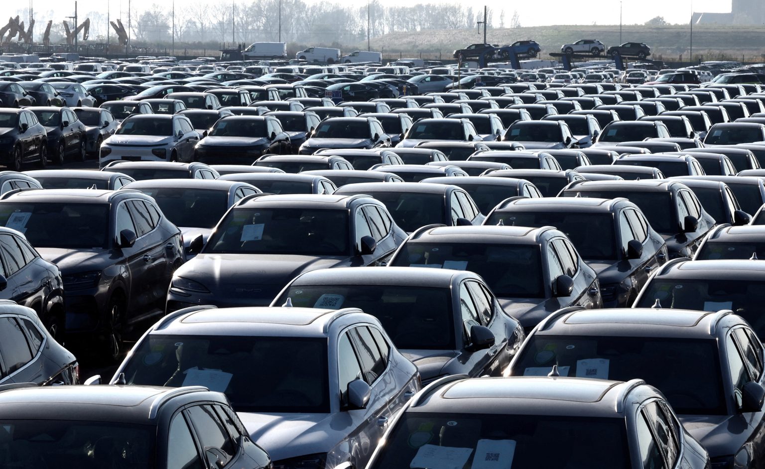 Dozens of parked cars ready to be sold. Photo: Yves Herman/Reuters