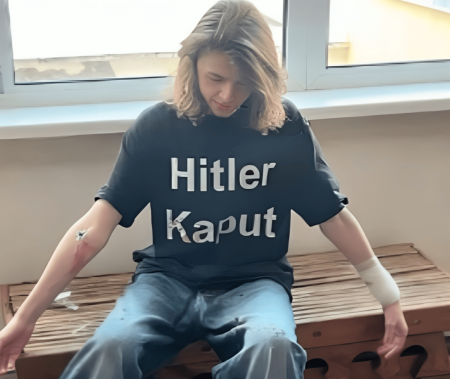 A 14-year-old student wearing a T-shirt with the words "Hitler kaput" attacked a school in Kiev. He was allegedly linked to the Kremlin.