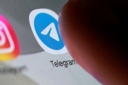 Russia restricts Telegram, threatening it with millions in fines