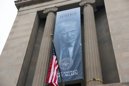 Trump banner raised on façade of US Justice Department