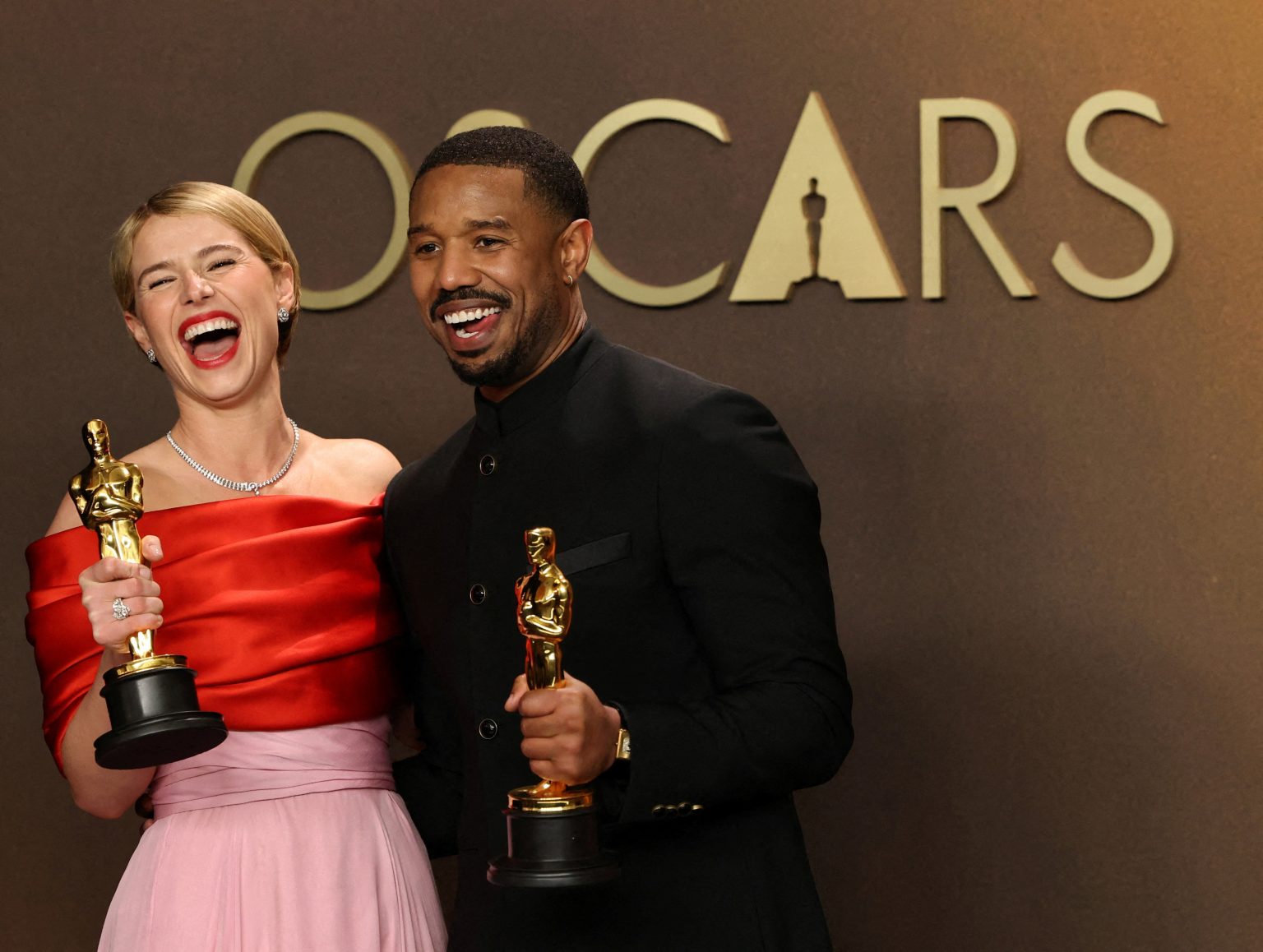 Jessie Buckley and Michael B. Jordan pose with their Oscars for best actress for ‘Hamnet’ and best actor for ‘Sinners’. Photo: Mario Anzuoni/Reuters