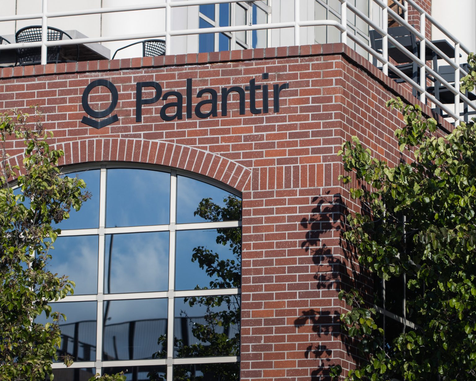 Exterior view of the Palantir office in Palo Alto, California. Palantir’s logo is inspired by the all-seeing eye from The Lord of the Rings, alluding to its data-driven intelligence capabilities.Photo: hapabapa/Getty Images