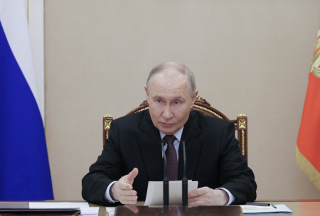 Putin urges use of energy windfall to cut debt