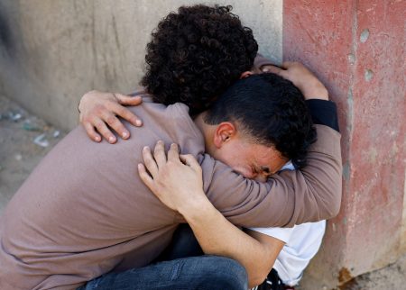 At least 10 dead after strike near Gaza school, reports say