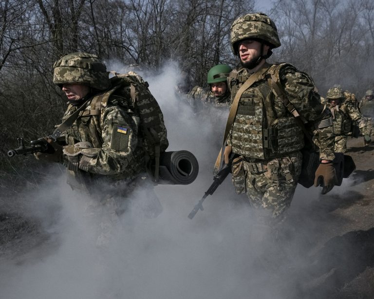 New recruits in the Ukrainian armed forces undergo initial military training. Photo: Stringer/Reuters