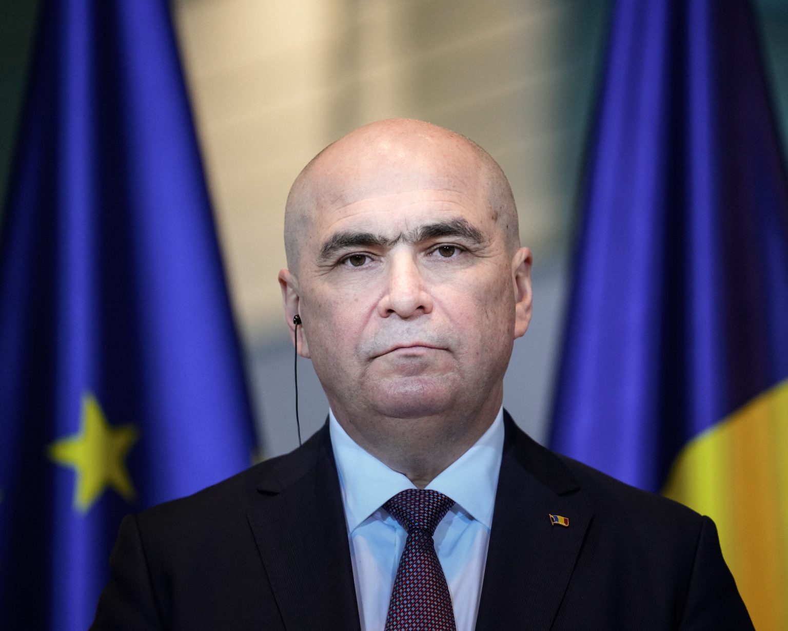 Romanian Prime Minister Ilie Bolojan faces mounting pressure ahead of a confidence vote. Photo: Ebrahim Noroozi/AP/AFP