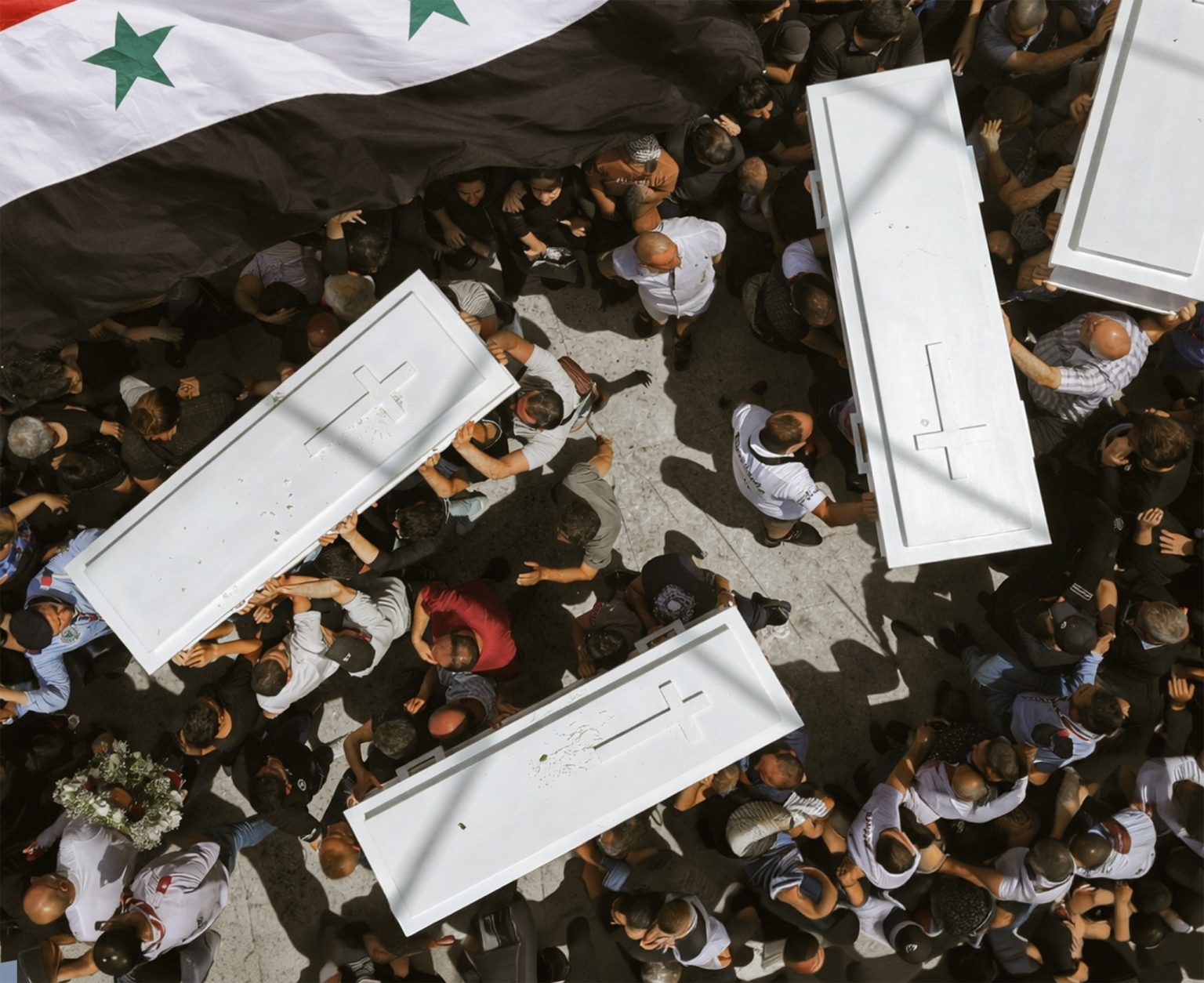 A mass funeral in Damascus after the Mar Elijah Church attack underscores the growing vulnerability of Syria’s Christian communities. Photo: Izettin Kasim/Anadolu via Getty Images