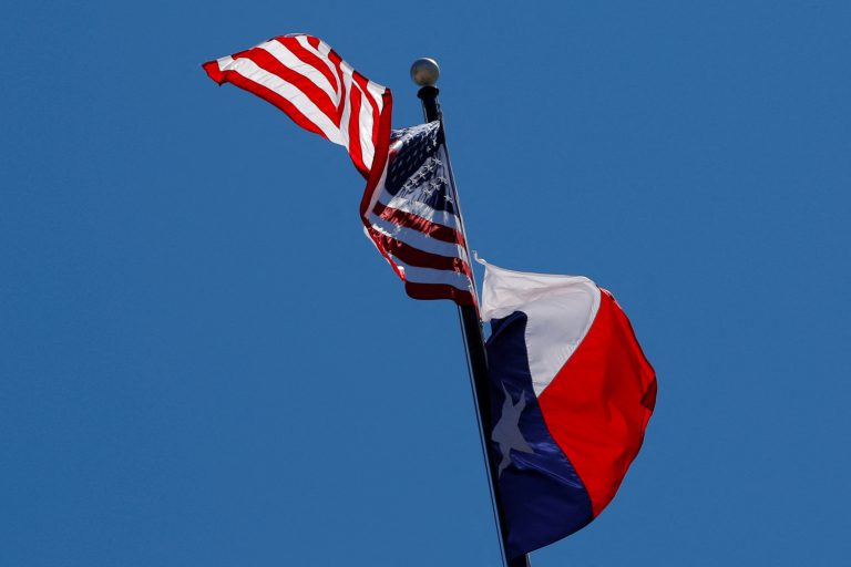 US flag and Texas state flag.