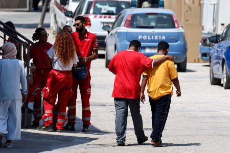 Migrants in Italy. Photo: Vincenzo Livieri/Reuters