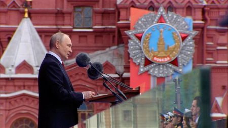 Vladimir Putin delivers a speech during a military parade.