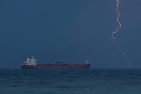 A tanker anchored off Sultan Qaboos Port in Muscat, Oman. Photo: Stelios Misinas/Reuters/File Photo
