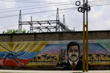 Nicolas Maduro is painted on a wall.