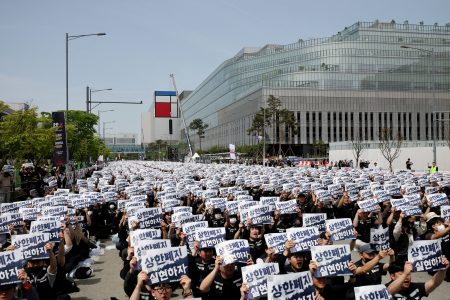 Samsung Electronics union members protest against compensation levels.