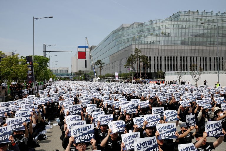 Samsung Electronics union members protest against compensation levels.