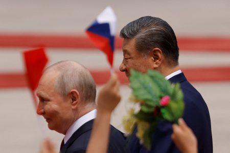 Vladimir Putin and Xi Jinping. Photo: Maxim Shemetov/Reuters