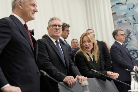 Norwegian, British, and Italian premiers in the photo.