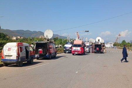 Iranian broadcast vans covering the war. Photo by Qamar Zaman/picture alliance via Getty Images