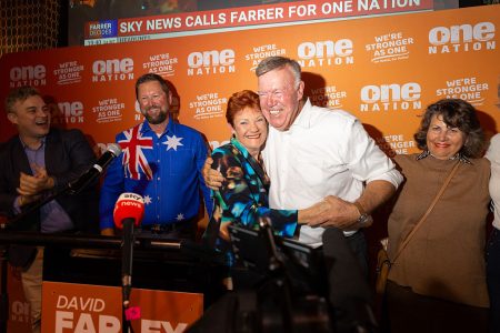 Pauline Hanson celebrates with David Farley after One Nation’s breakthrough victory in the Farrer by-election. Photo: Jesse Thompson/Getty Images