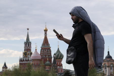 A man stands on Red Square in Moscow. Photo: Ramil Sitdikov/Reuters