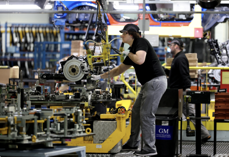 Workers assemble vehicles at a manufacturing plant as the EU seeks to reduce supply-chain dependence on China. Photo: Phil Noble/Reuters