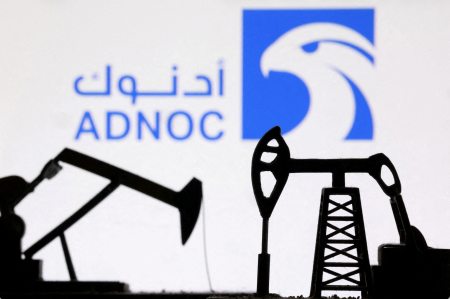 Illustration shows 3D printed oil pump jacks and Abu Dhabi National Oil Company (ADNOC) logo. Photo: Dado Ruvic/Reuters