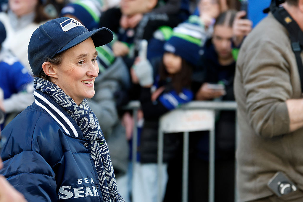 Seattle Mayor Katie B. Wilson celebrates with fans.