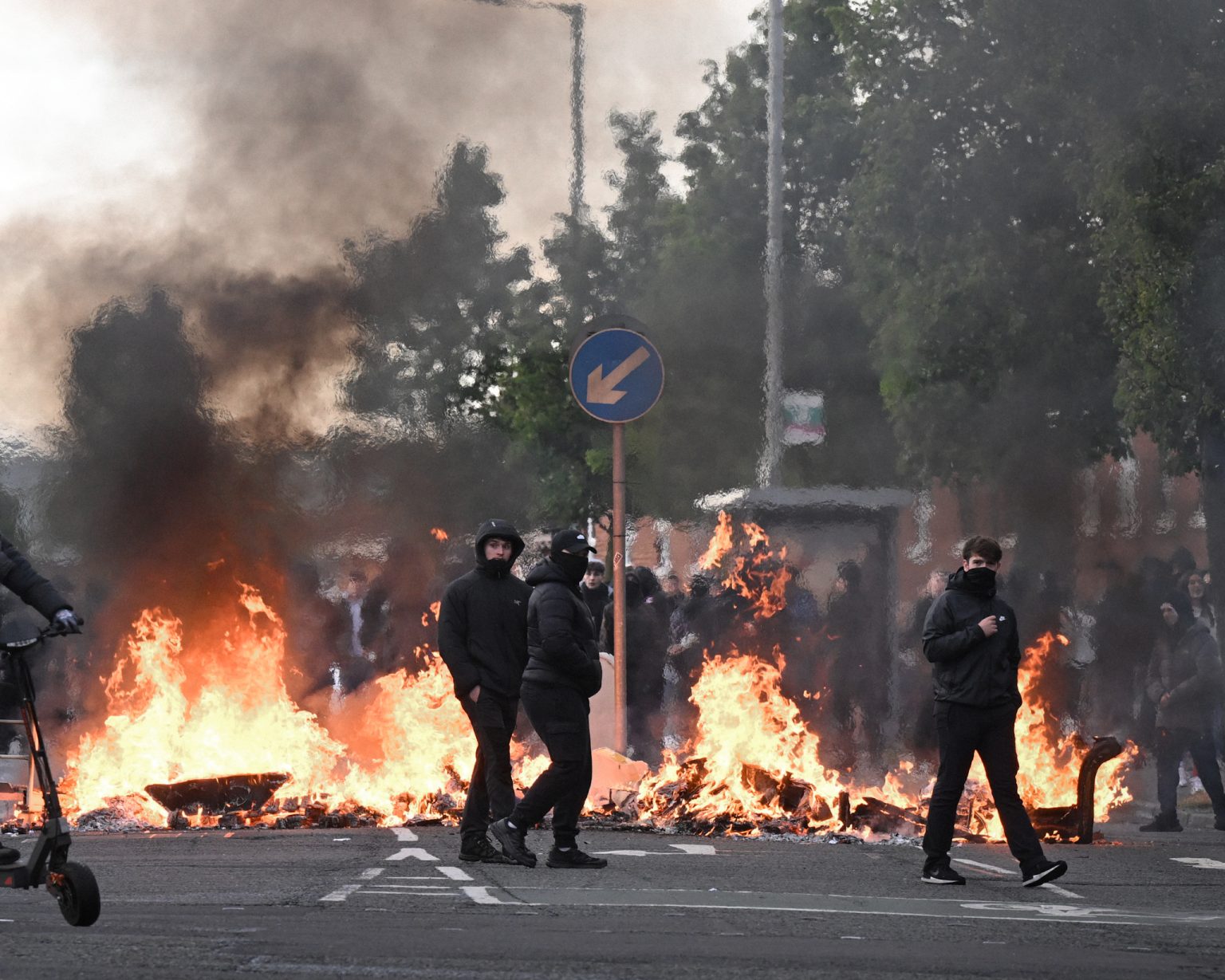 Belfast burns after a knife attack.