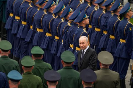 Vladimir Putin with soldiers.