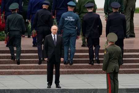 Vladimir Putin with soldiers.