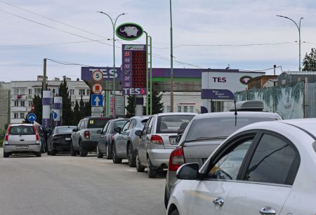 Cars line up for fuel at a gas station in Sevastopol.