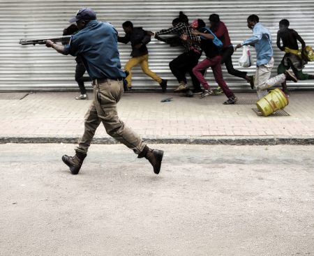 Protesters and police during a protest in Pretoria.