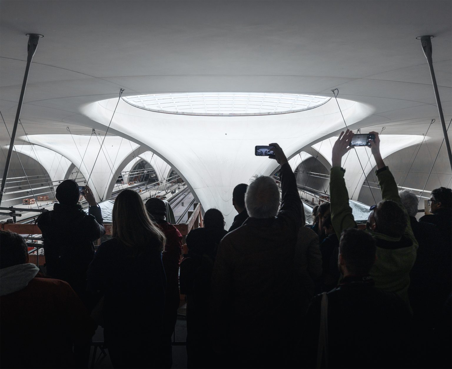 Visitors inspect the concourse of Stuttgart's future station.