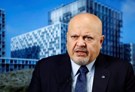 Karim Khan.