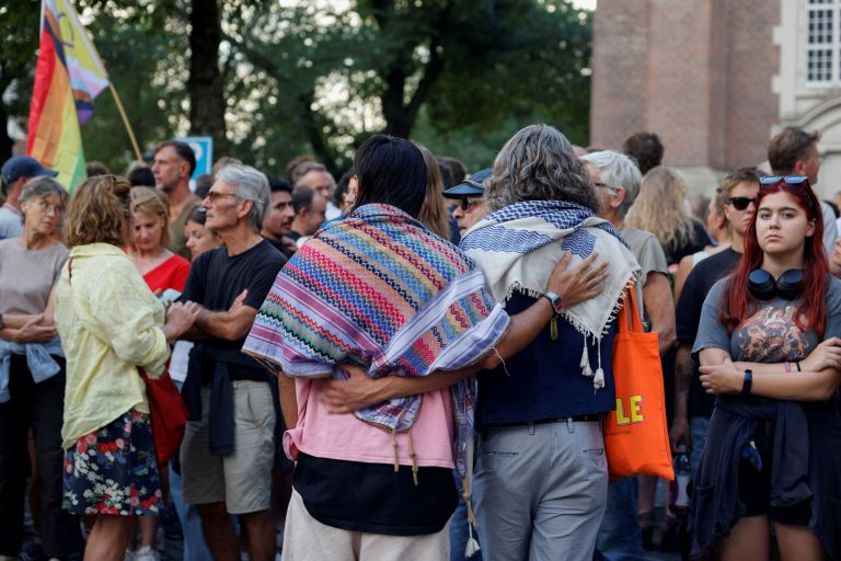 Memorial service at Amsterdam's Homomonument.