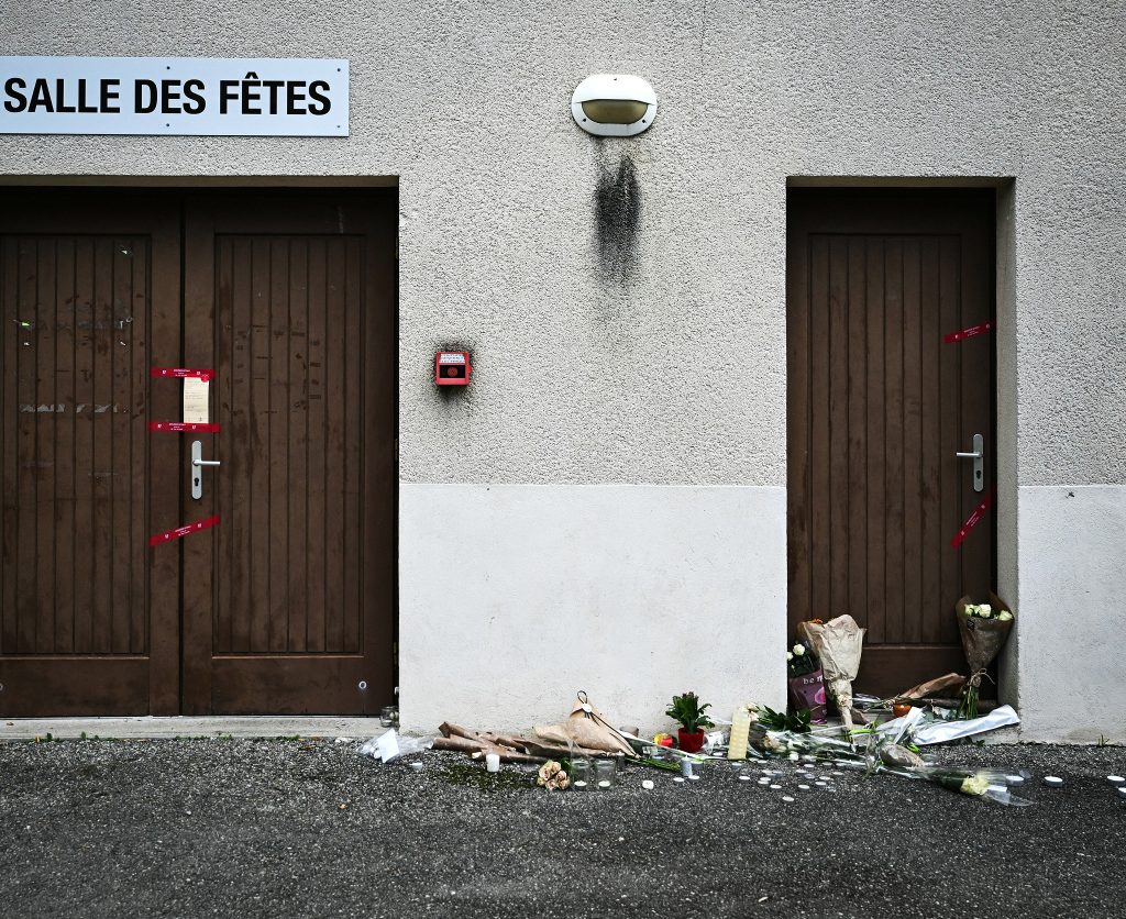 Flowers outside the reception hall in Crépol, where Thomas Perotto was fatally stabbed during a village dance in November 2023. Photo: Olivier Chassignole/AFP/Profimedia