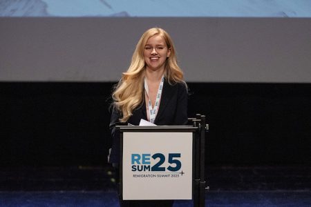 Eva Vlaardingerbroek speaks at a summit in Italy.